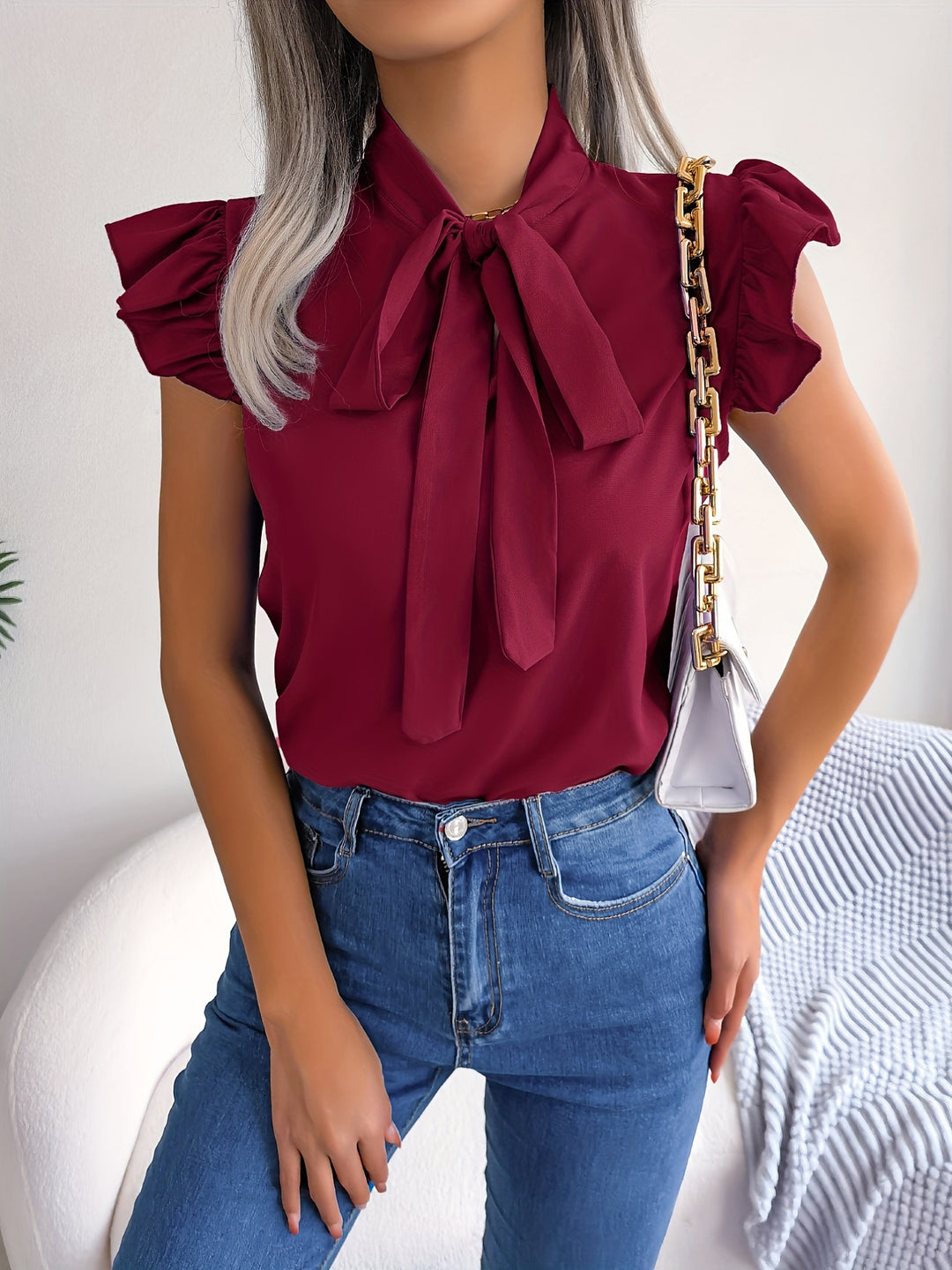 Evy | Elegant Bow-Tie Flutter Sleeve Blouse