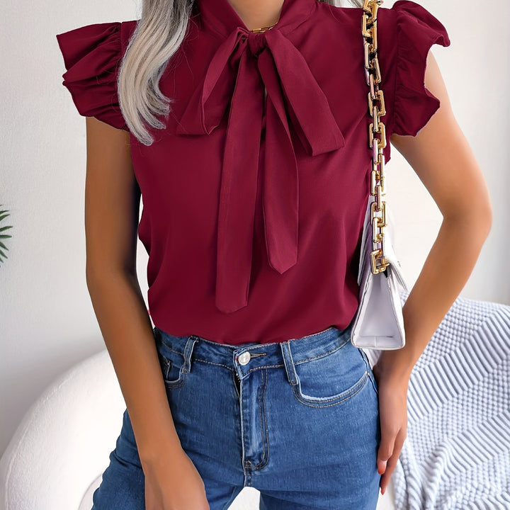 Evy | Elegant Bow-Tie Flutter Sleeve Blouse